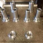 Custom fabricated threaded sleeves and nuts